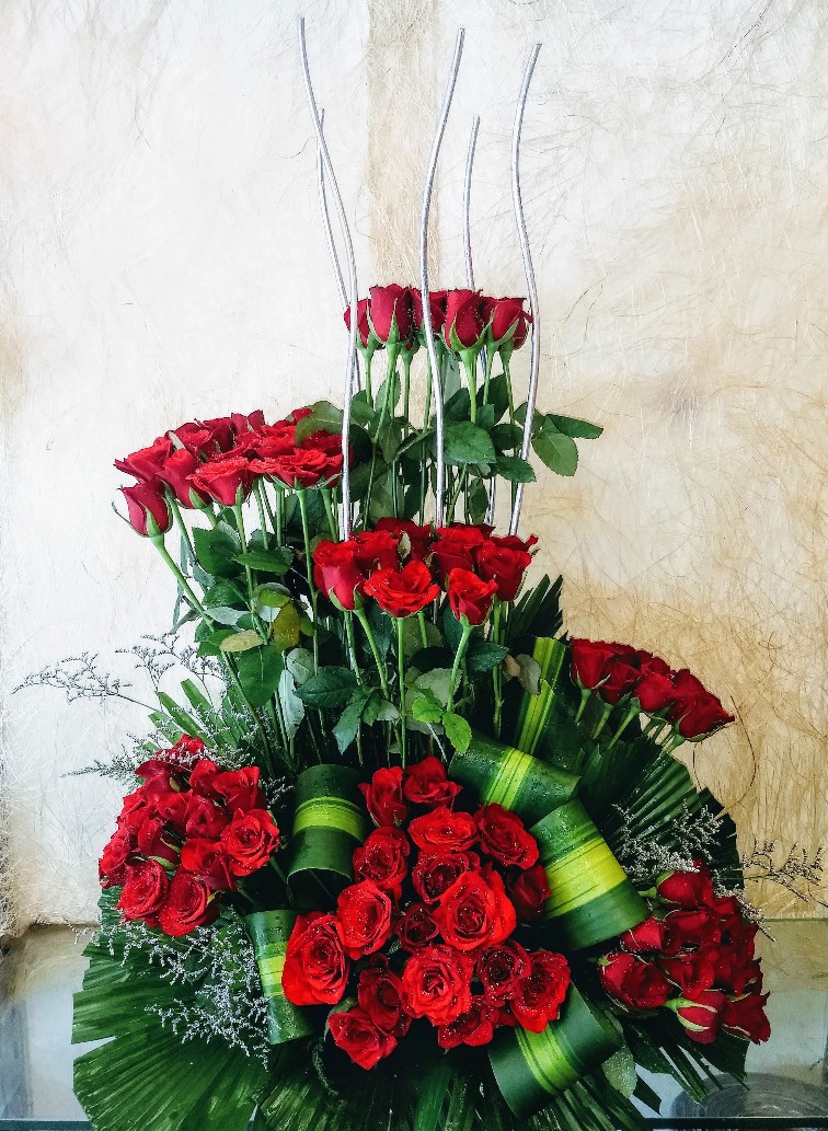 send flower Palam VillageArrangement of 50 Red Roses