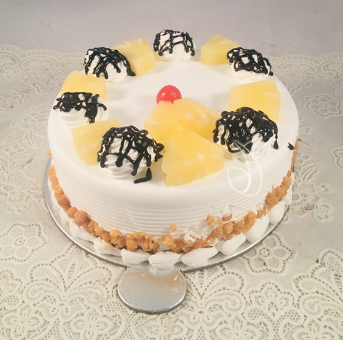 send flower Sarai Rohilla DelhiRound Pineapple Cake