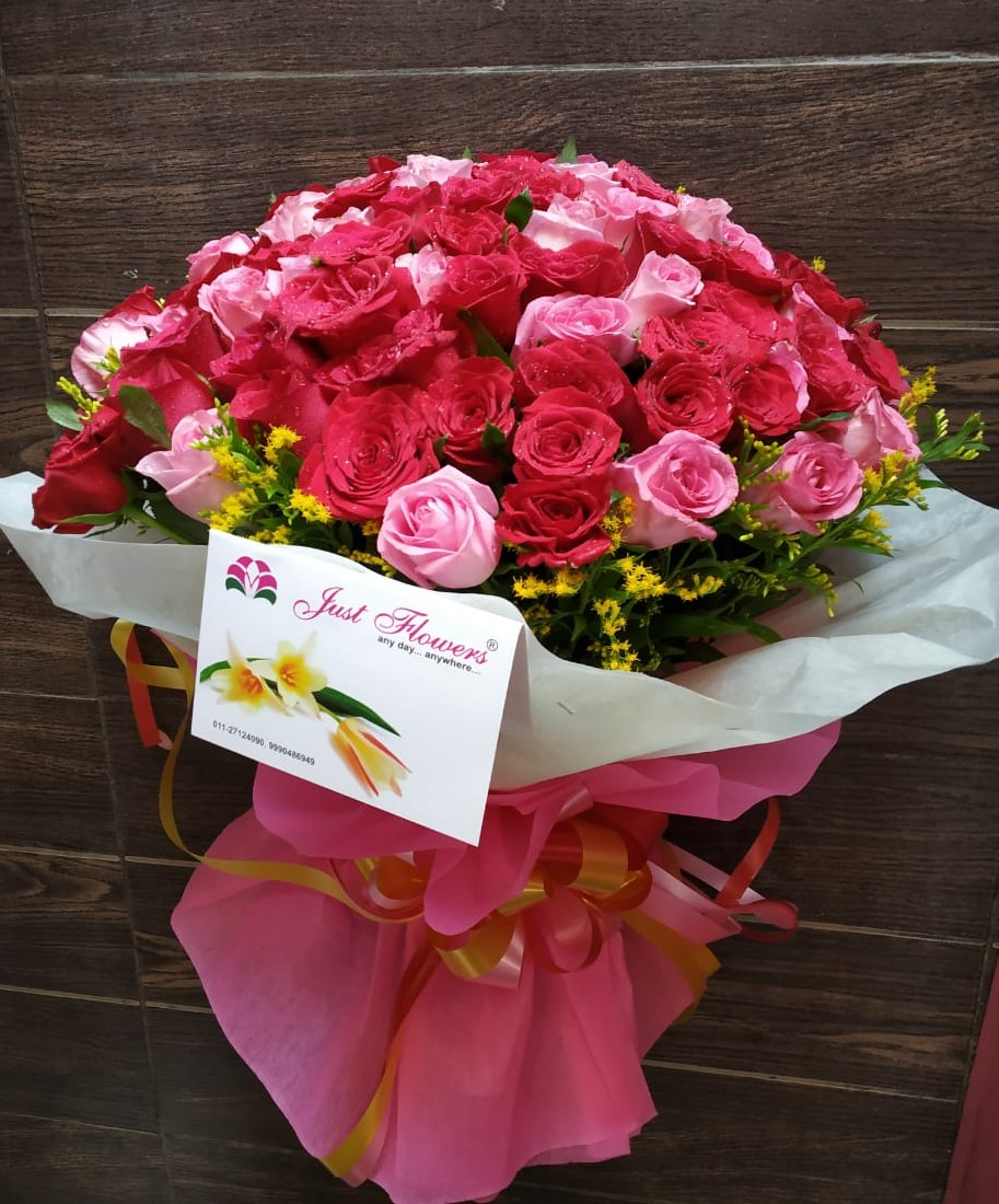 send flower West Patel NagarPink Roses in Wrapped 