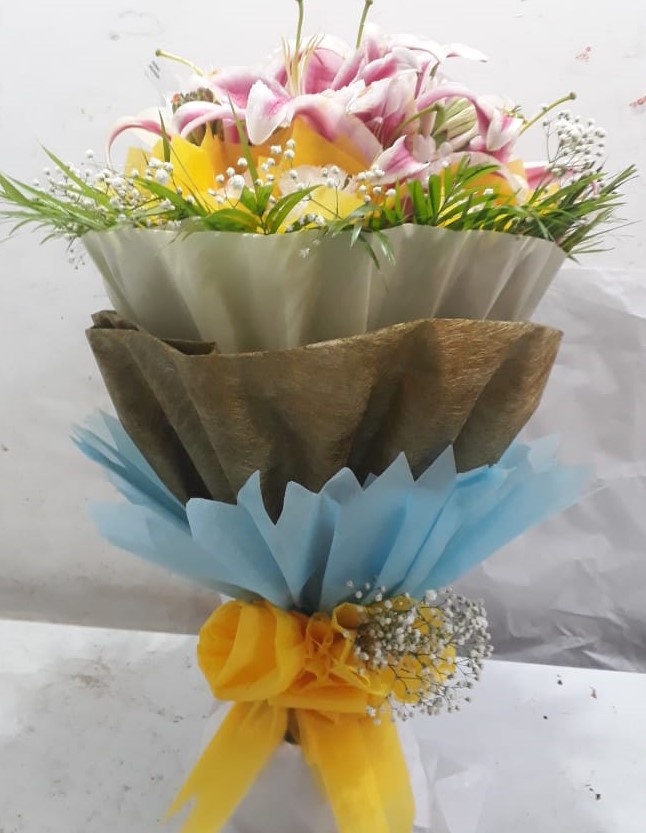 send flower Karol Bagh DelhiBunch of 8 Pink Oriental Lillys in 3 Layer Packing