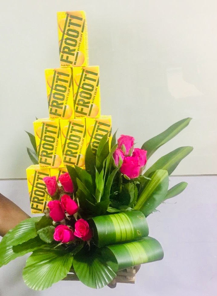 send flower Telewara Delhi10 Frooti & 10 Pink Roses Arrangement